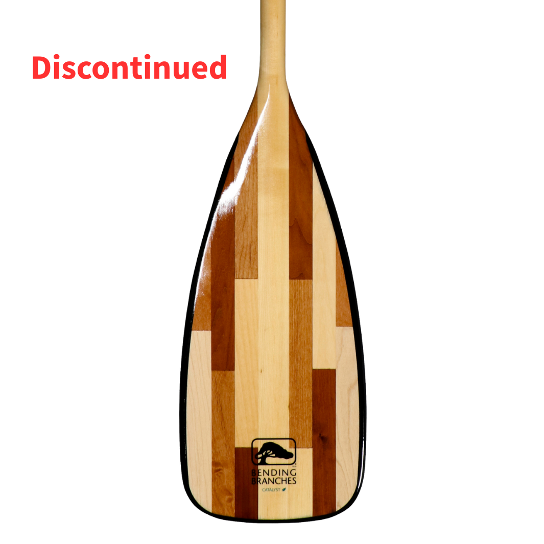Wooden paddle with a brand logo on a white background, labeled 'Discontinued'.