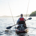 Kayak angler paddling towards the horizon 