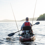 Kayak angler paddling towards the horizon 