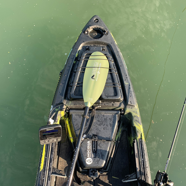 angler classic snap button sage green on bow of fishing kayak